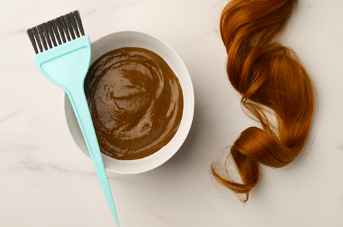 Henna paste for achieving luscious locks.